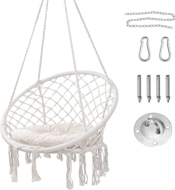 White macrame hanging egg chair with cushion and fringe